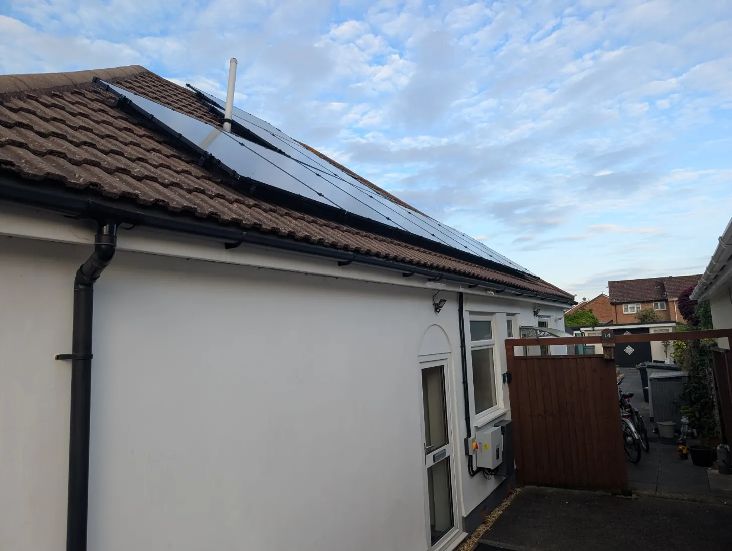 Solar panels on a white residential roof