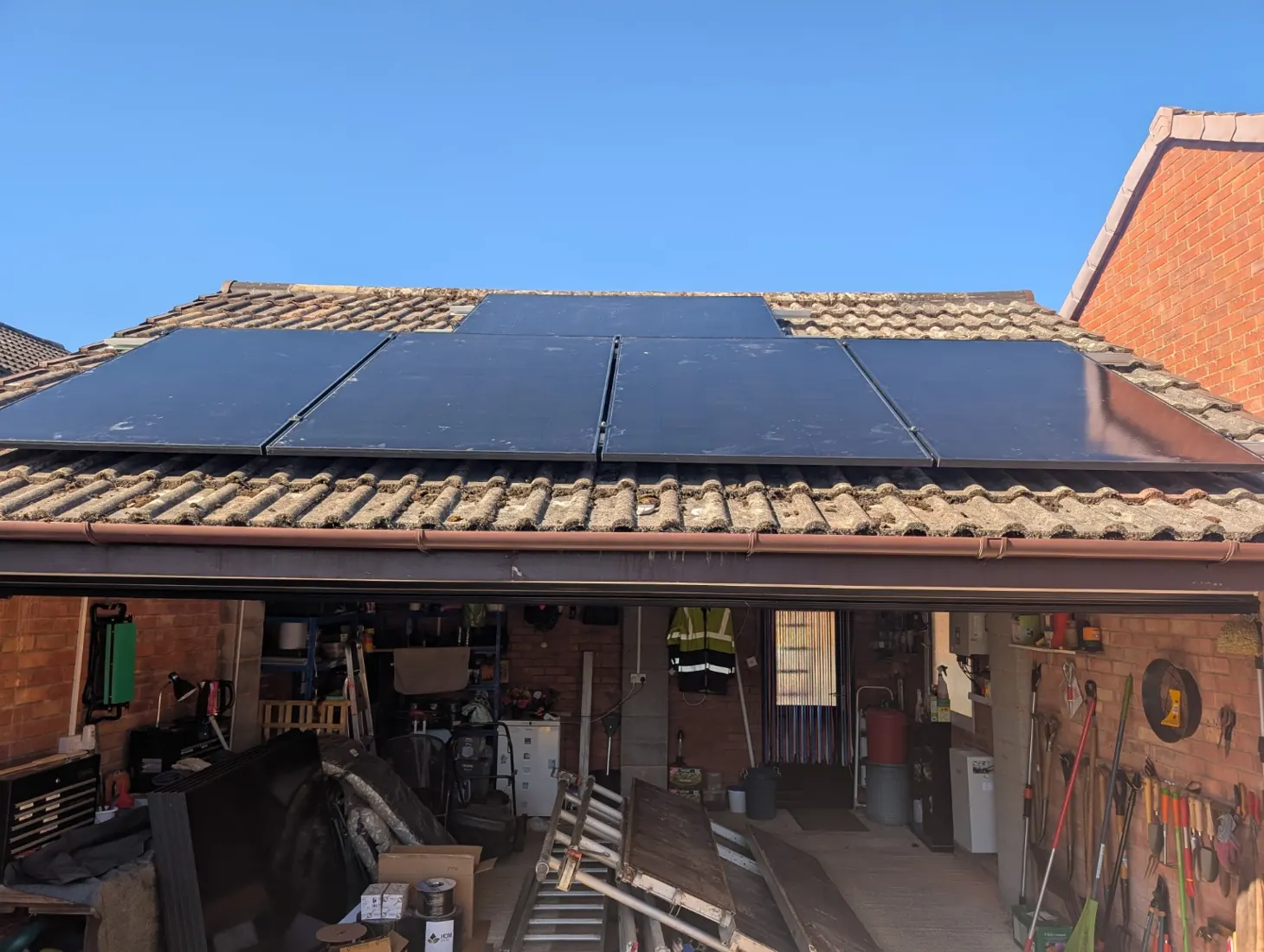 Solar panels installed on a garage roof